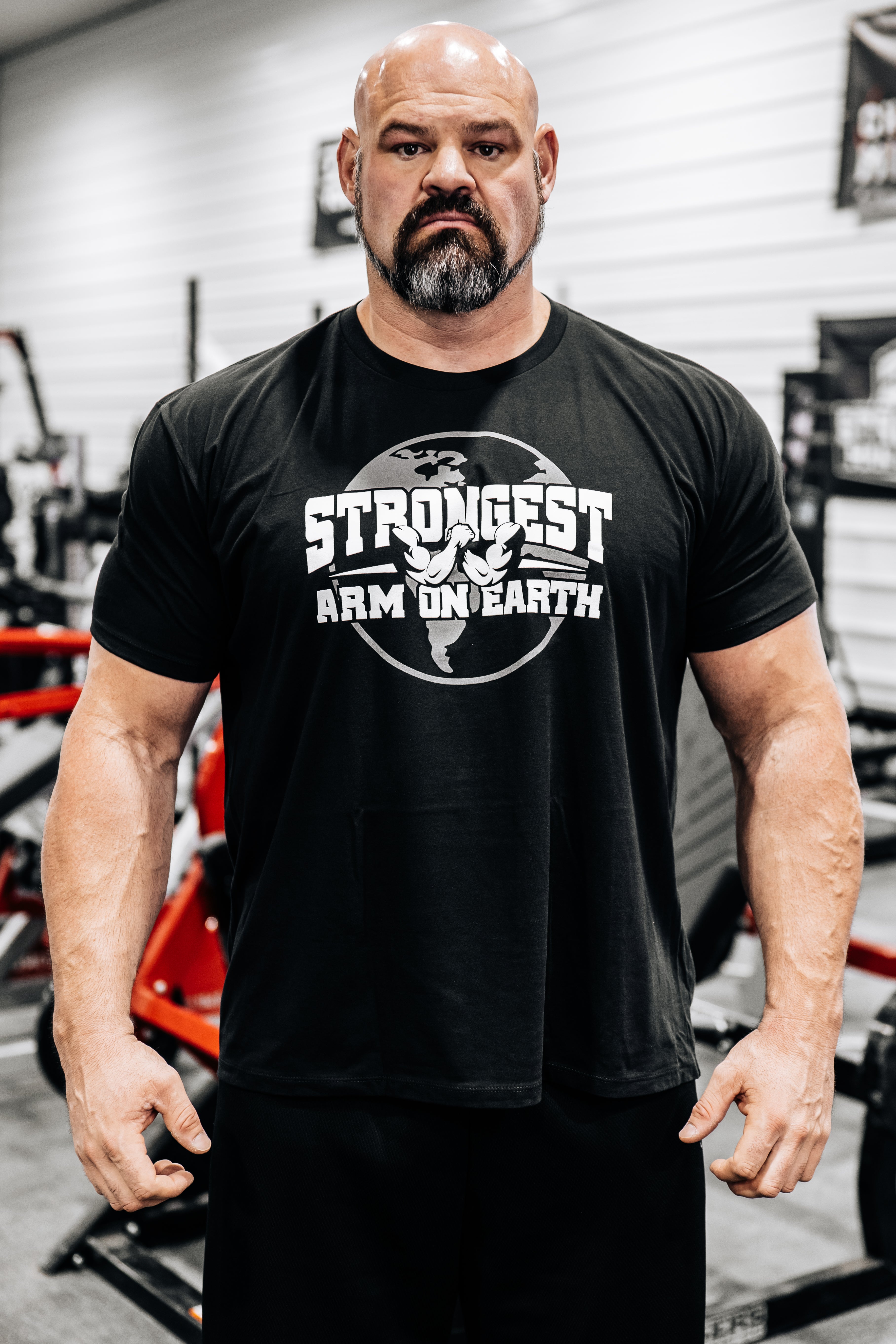 STRONGEST ARM ON EARTH T-SHIRT