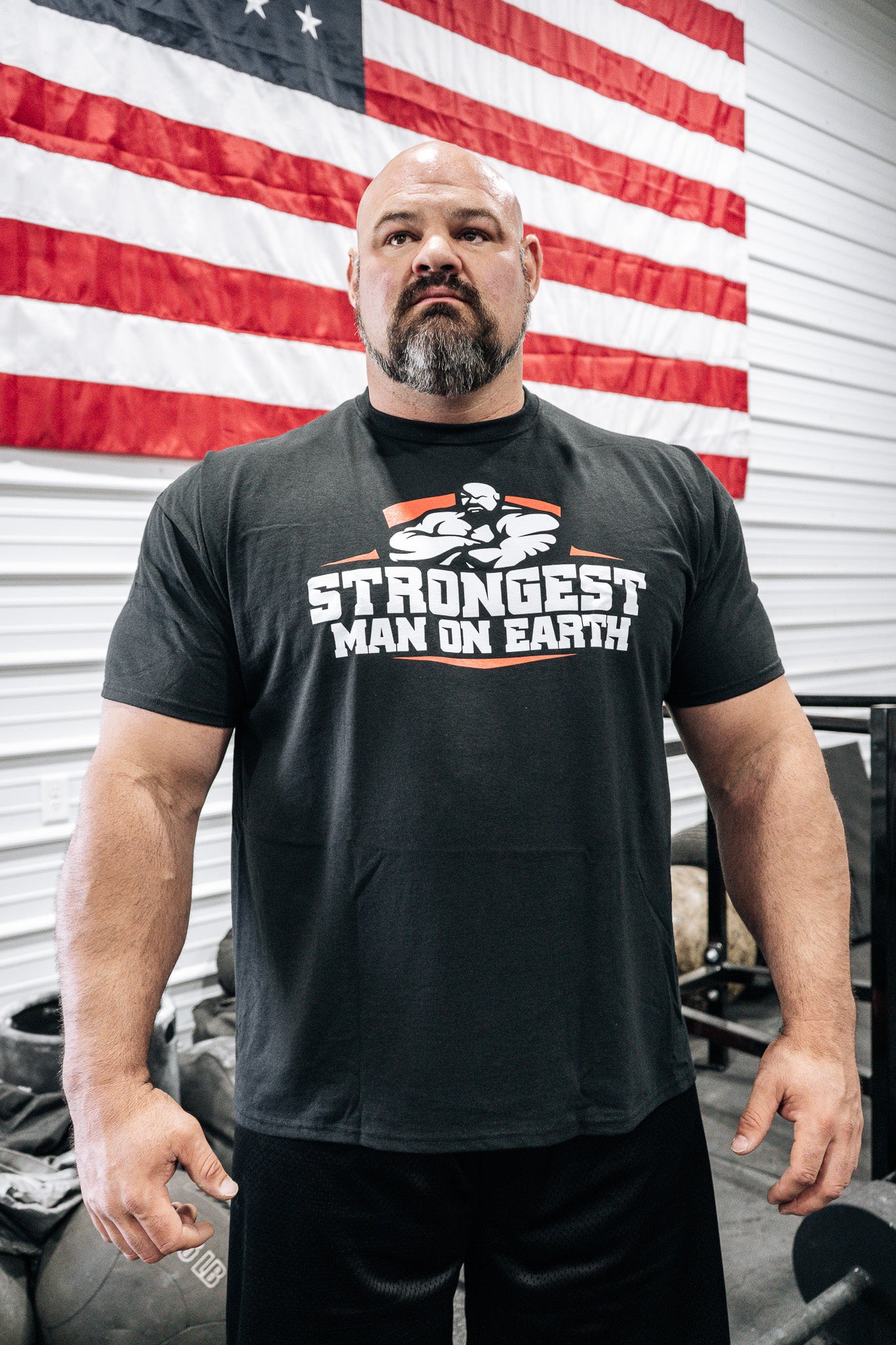 STRONGEST MAN ON EARTH RED T-SHIRT - ALL SALES FINAL