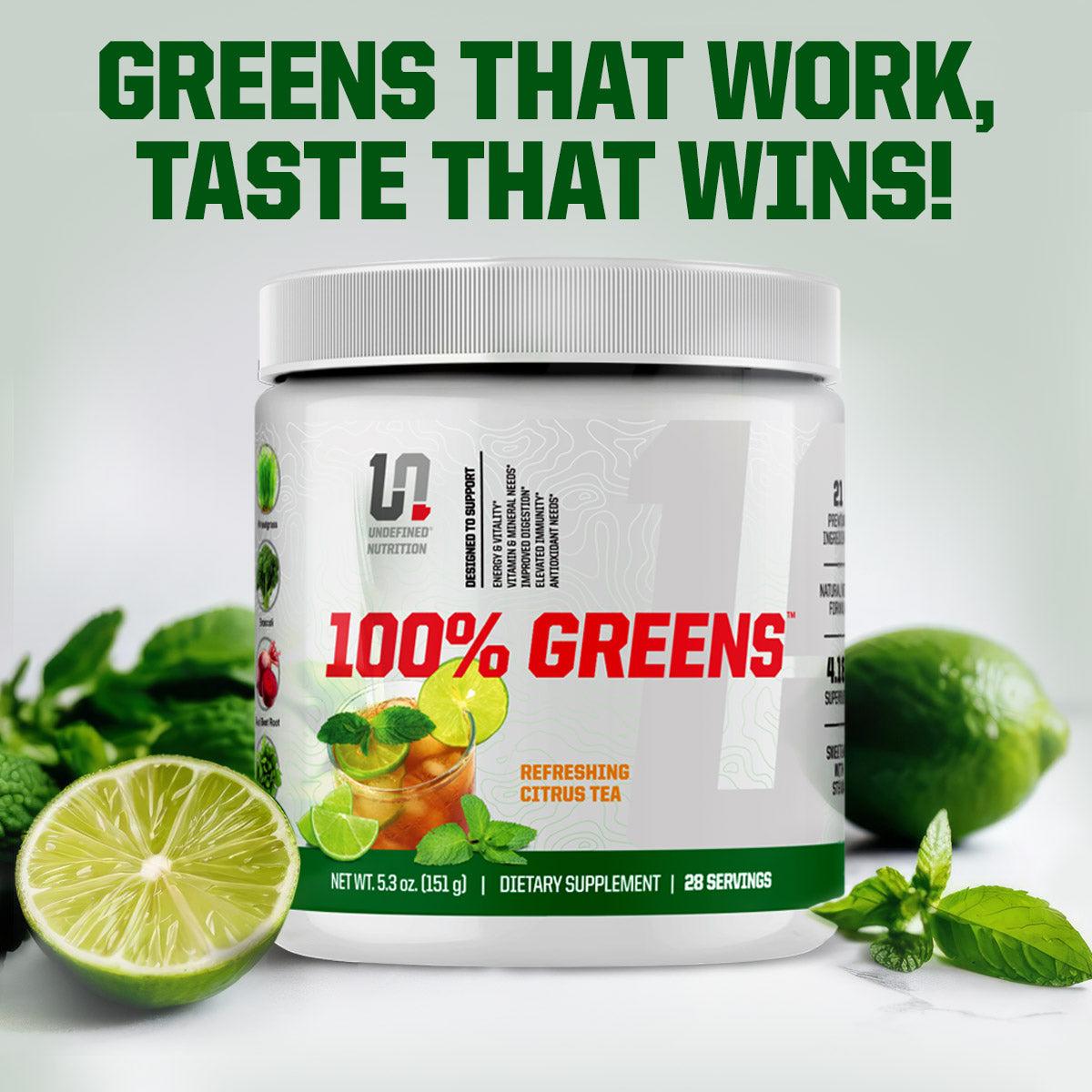 Supplement container labeled '100% Greens' with lime and mint leaves on a light background